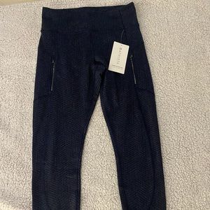 Navy and Black Athleta tights